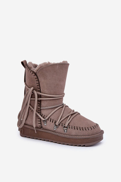 Luxury women's insulated snow boots by Step in Style, featuring a stylish asymmetrical design in premium suede and fur for ultimate winter comfort.