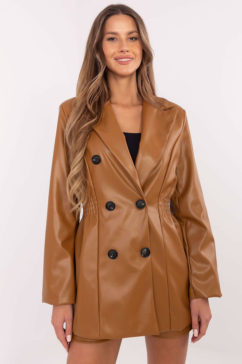 Elegant women's eco-leather jacket by Italy Moda, featuring wide lapels, a double-breasted design, and a comfortable lining for luxurious style and warmth in fall and winter.