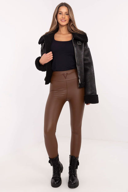 Versatile tapered fit eco-leather leggings by NM, an essential for women seeking both warmth and trendiness during colder days.