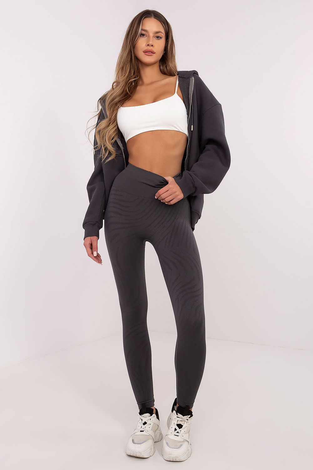 Luxury stylish high-waisted long leggings with animal motif by NM, perfect for gym and yoga, featuring a unique textured design.