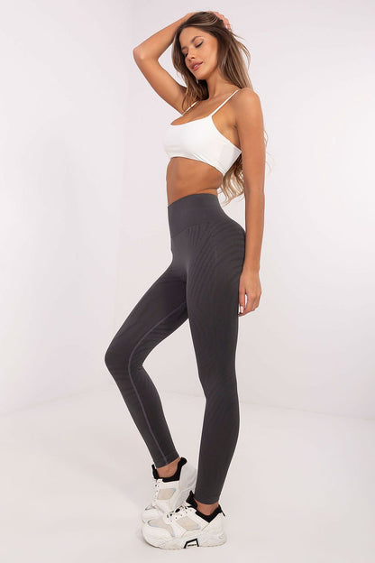 Chic long leggings with a trendy animal print by NM, perfect for active women seeking both style and functionality in their workouts.