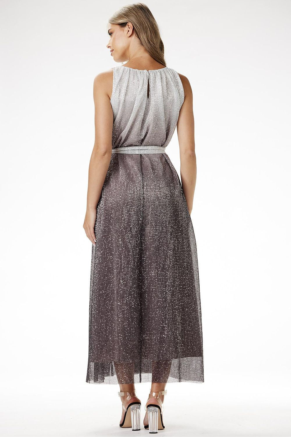 Awama's Elegant Ombre Sequin Knit Maxi Dress displayed elegantly on a hanger, highlighting its fitted silhouette and satin lining.