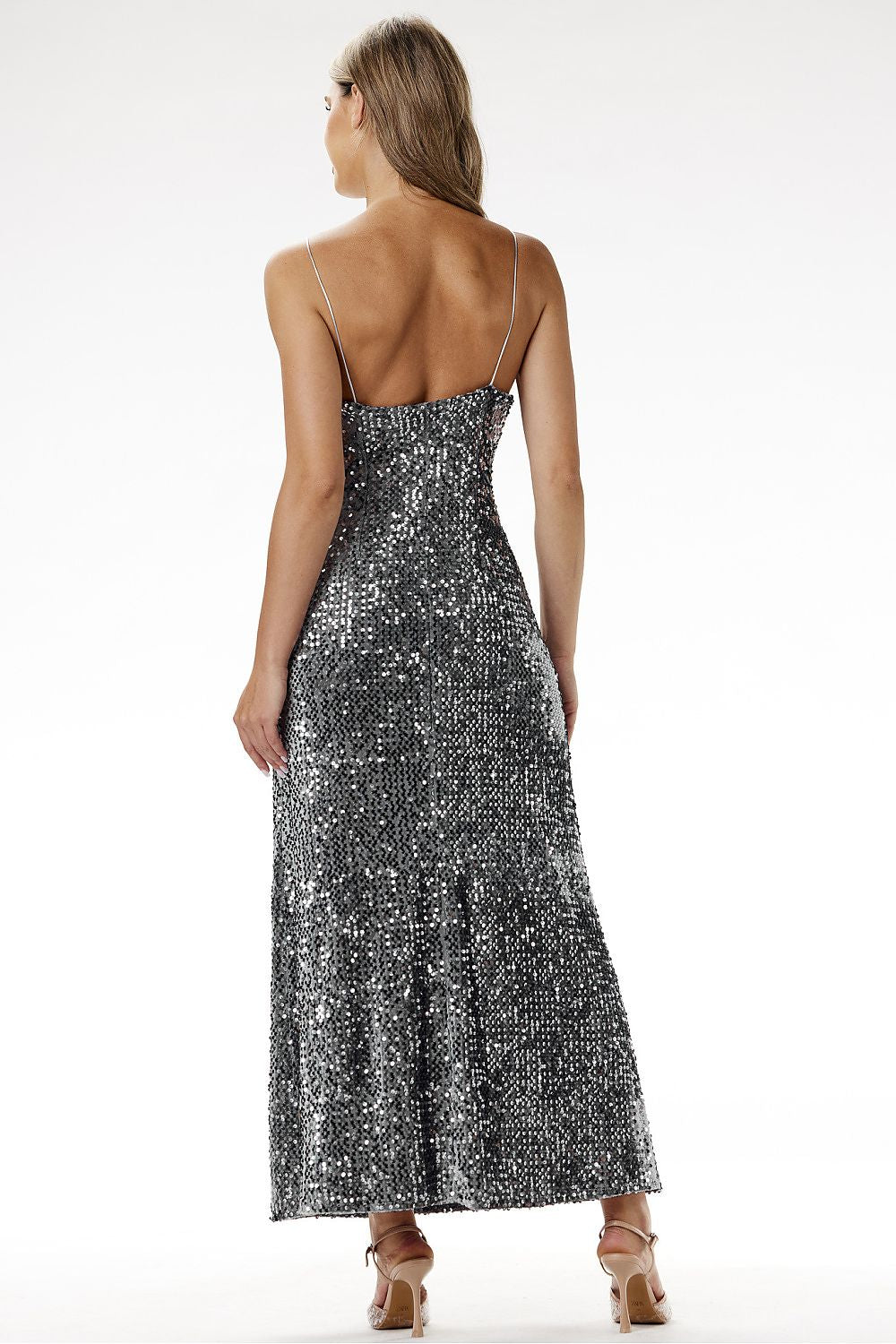 Awama's stunning evening maxi dress showcasing exquisite sequins and a flattering fitted cut, designed to enhance your silhouette for glamorous outings.