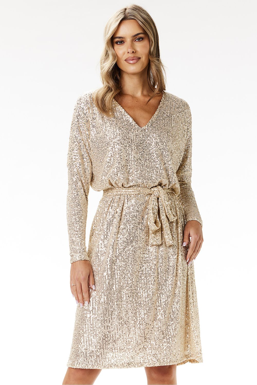 Awama's luxurious sequined midi dress styled for an elegant event, exemplifying sophistication and comfort.