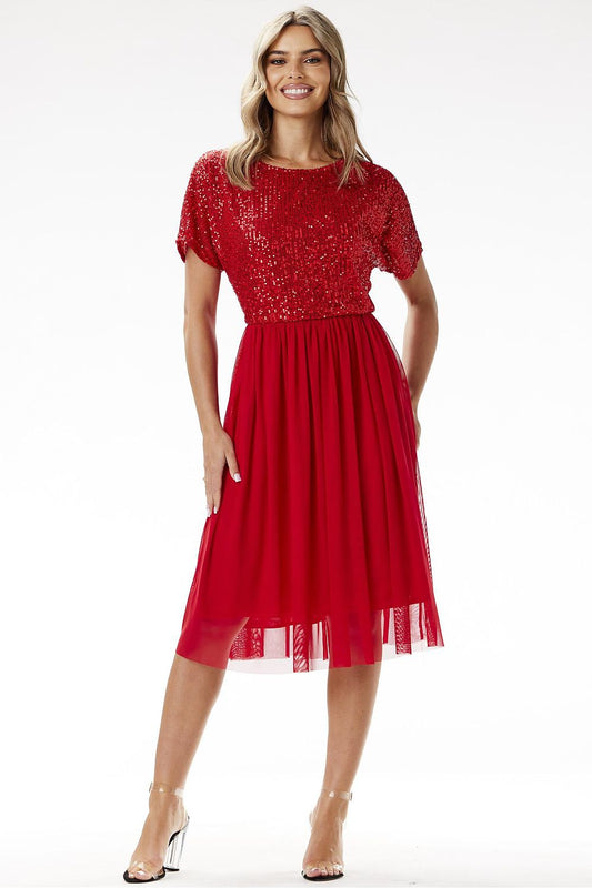 Stunning close-up of the Awama Kimono Evening Dress showcasing intricate sequins and tulle detailing, designed for elegance and comfort at formal events.