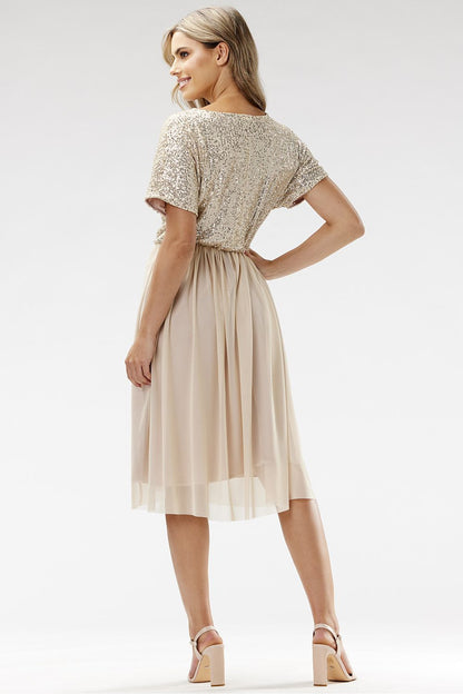 Stunning Awama evening dress displayed elegantly to showcase its tulle design and sequined details.