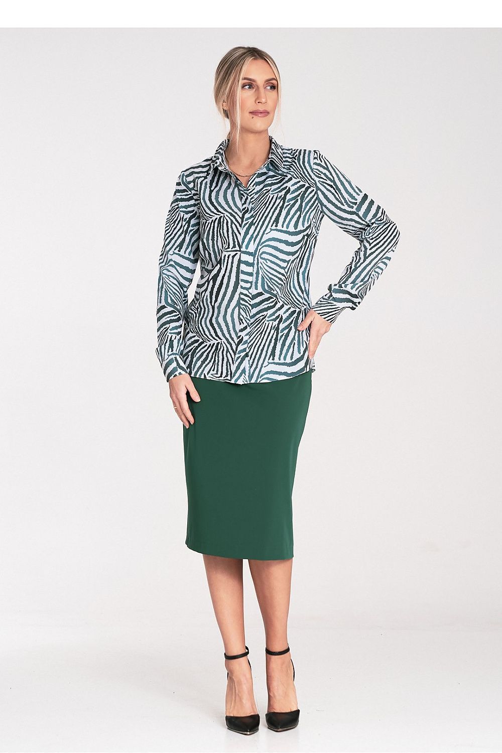 Stylish Figl women's long sleeve shirt with silver snap closure, accentuating a luxurious design suitable for any occasion.