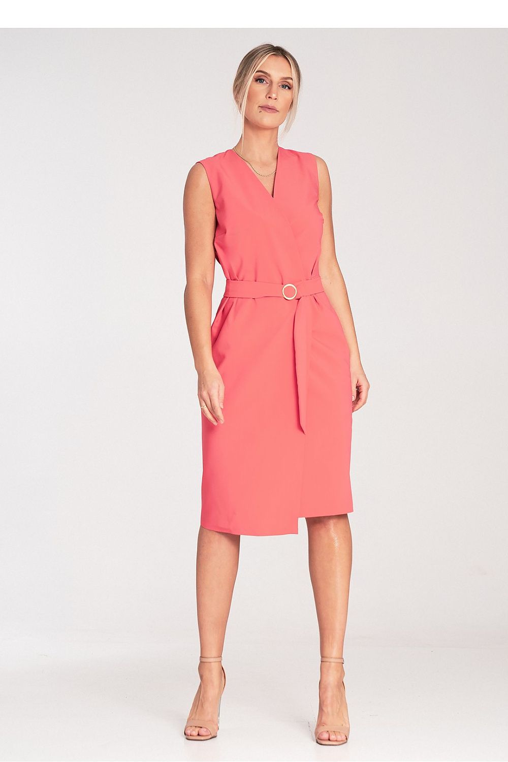 Side view of the Figl sleeveless midi dress, illustrating the elegant pencil bottom design combined with a chic belt and gold buckle.