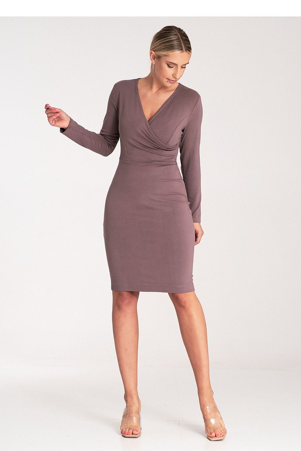 Detailed view of Figl's Fitted V-Neck Dress, showcasing premium fabric and a flattering silhouette.