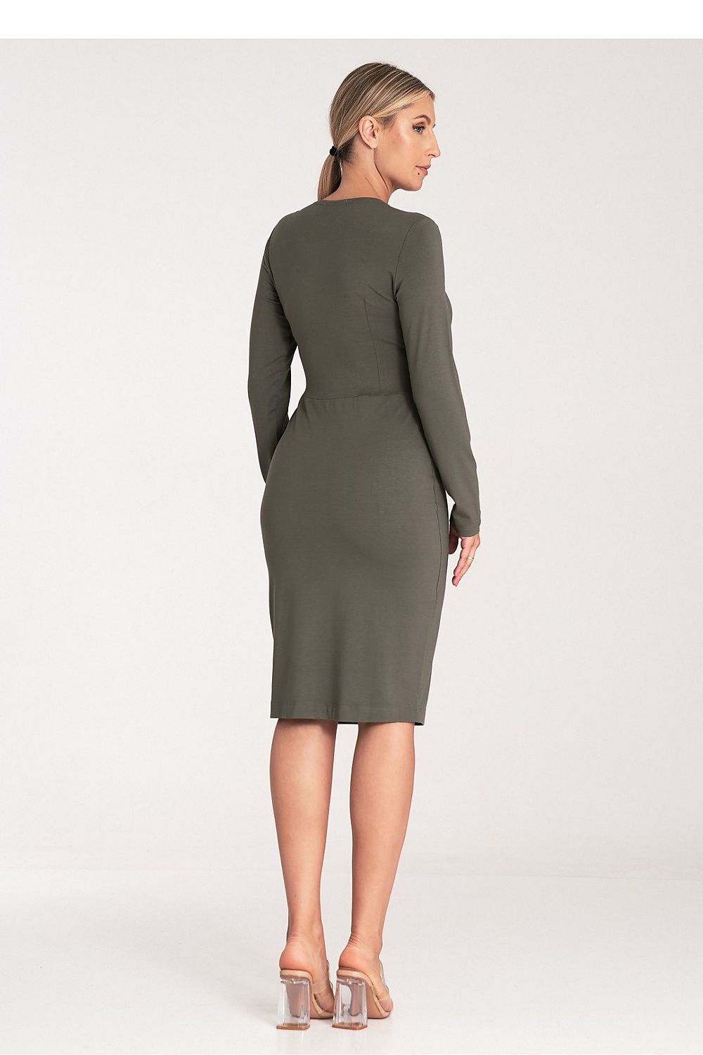 Elegant Figl dress featuring a stylish V-neckline and sophisticated long sleeve design, ideal for chic occasions.