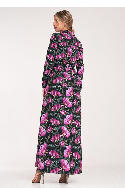 Elegant Figl maxi dress featuring long sleeves, a chic waist tie, and graceful side slits, perfect for sophisticated occasions.