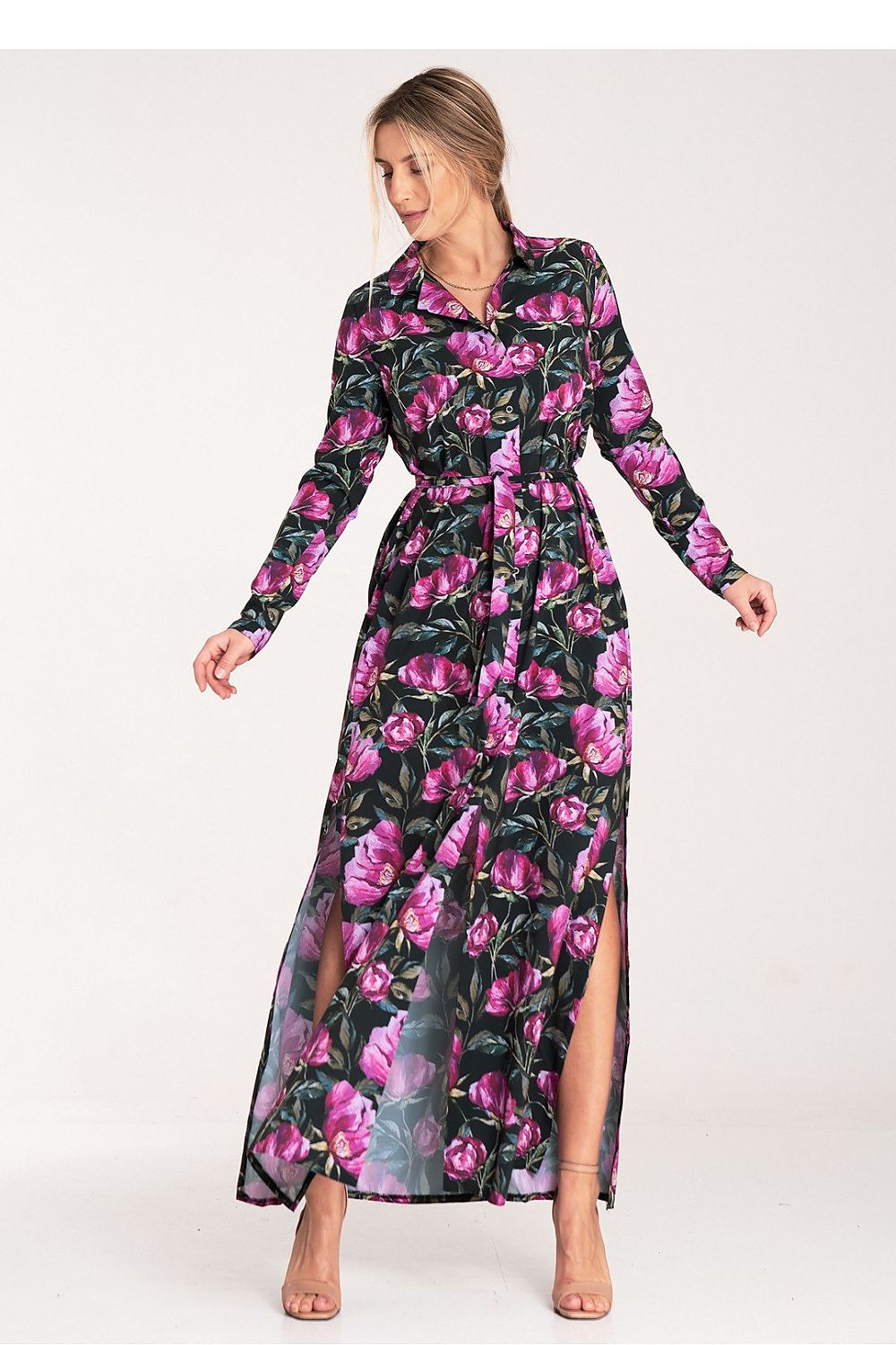 Luxurious Figl maxi dress displayed on a model, showcasing flowing fabric and stylish long sleeves in a fashionable silhouette.