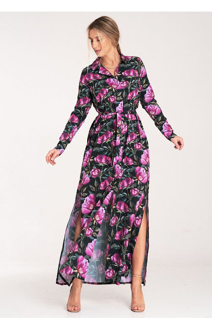 Luxurious Figl maxi dress displayed on a model, showcasing flowing fabric and stylish long sleeves in a fashionable silhouette.