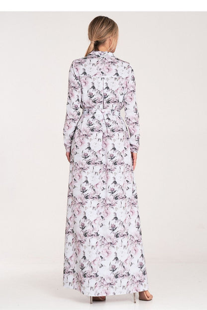 Close-up of the Figl Maxi Dress fabric, demonstrating the soft polyester blend and its graceful flow.