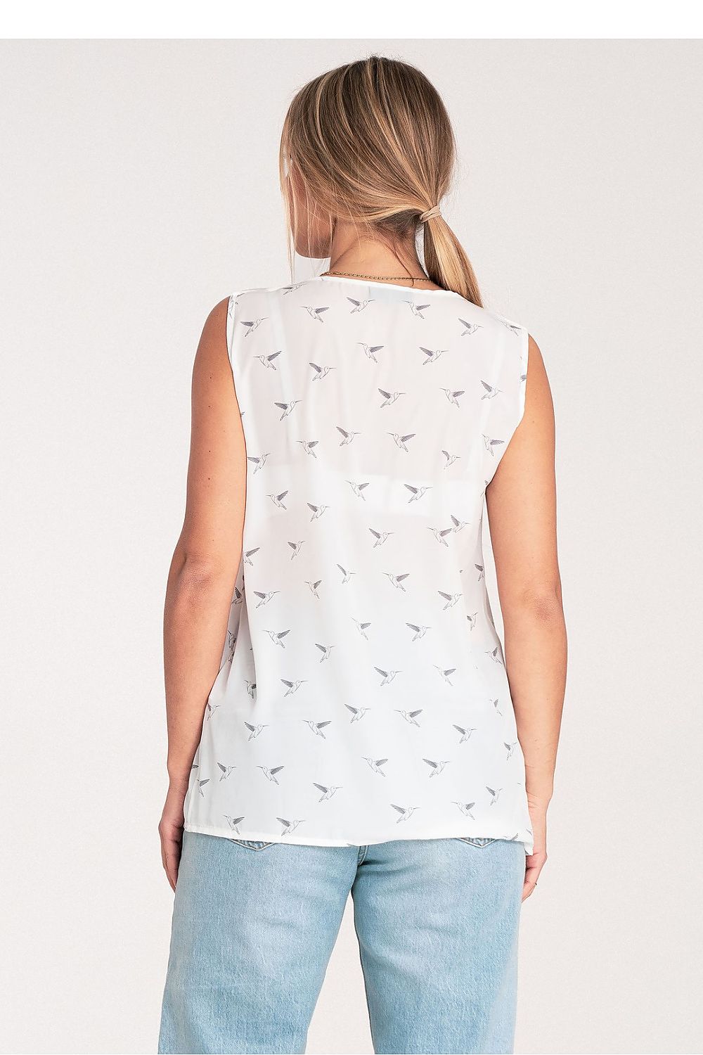 Stylish Figl Women's blouse made of 100% polyester, designed with thick shoulder straps and a rounded heart neckline for a trendy appeal.