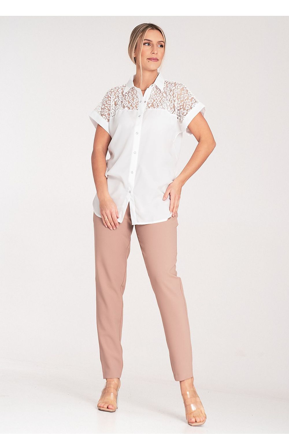 Elegant short sleeve shirt by Figl, highlighting its unique sheer design and sophisticated silhouette.