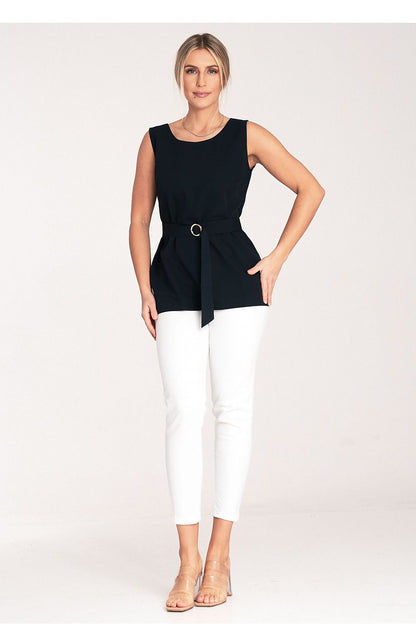 Close-up of the Figl blouse, highlighting the exquisite fabric and chic boat neckline, perfect for elegant occasions.