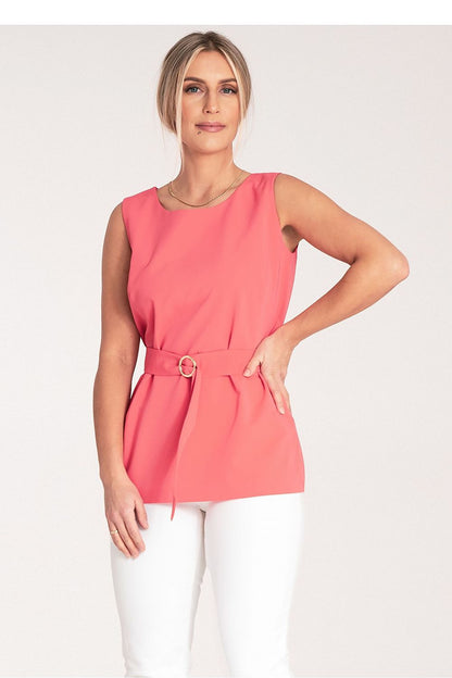 Close-up of Figl trapezoidal blouse, showcasing the luxurious gold buckle and high-quality fabric details.