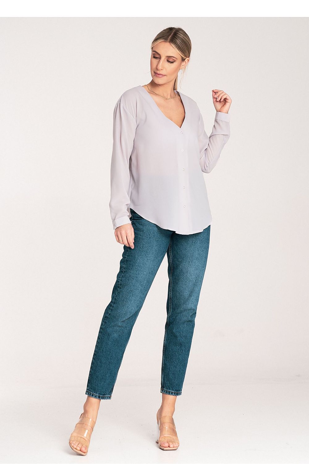 Elegant Figl long sleeve shirt showing fine detailing of the cuff fastening and cheeky neckline, showcasing sophisticated style.