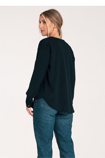 Close-up of the luxury Figl shirt's cuff details with press-stud fastenings and unique neckline design.