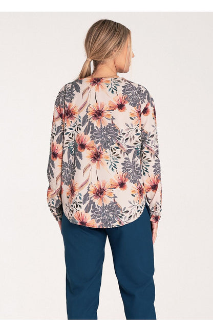 Luxury Figl long sleeve shirt laid flat, highlighting its elegant cut and fashionable cheeky neckline for modern style.