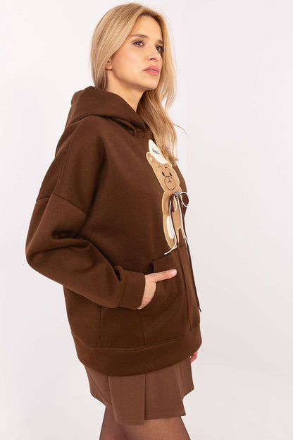 Close-up of the cute teddy bear patches on Italy Moda's luxury women's casual sweatshirt, adding a playful touch to everyday wear.