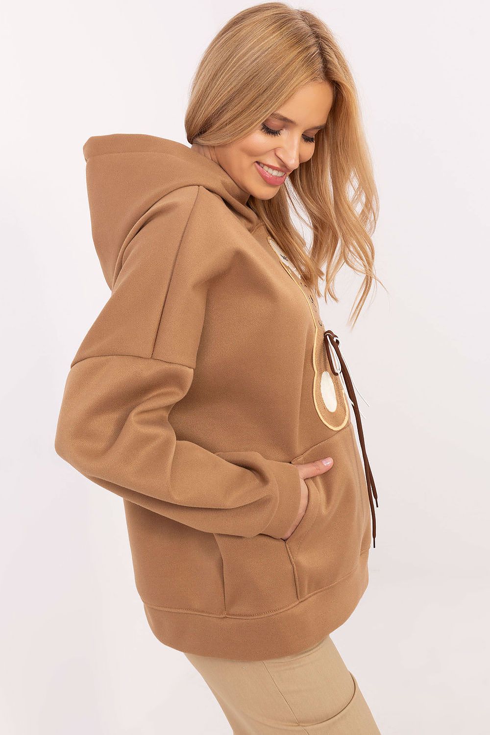 Close-up of Italy Moda's Luxury Women's Casual Sweatshirt with unique teddy bear patches, showcasing its comfortable polyester material and sporty hood.