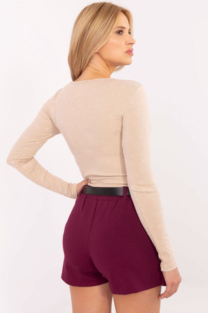 Close-up view of the ribbed texture and round neckline of the luxury cotton blouse by Factory Price, perfect for sophisticated casual wear.