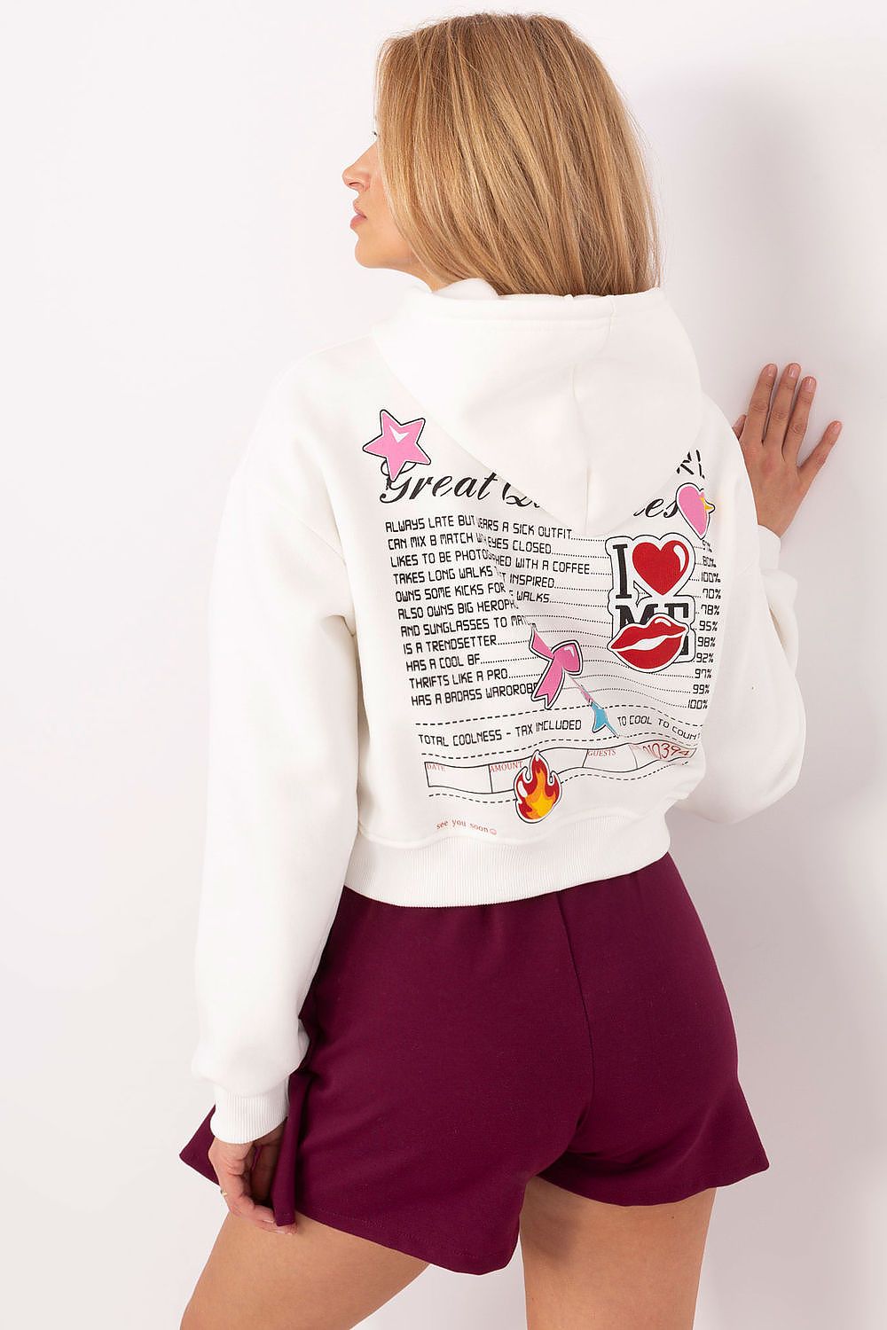 Fashionable hooded sweatshirt for women by Factory Price, crafted from a soft cotton-polyester blend, combining comfort and chic design.
