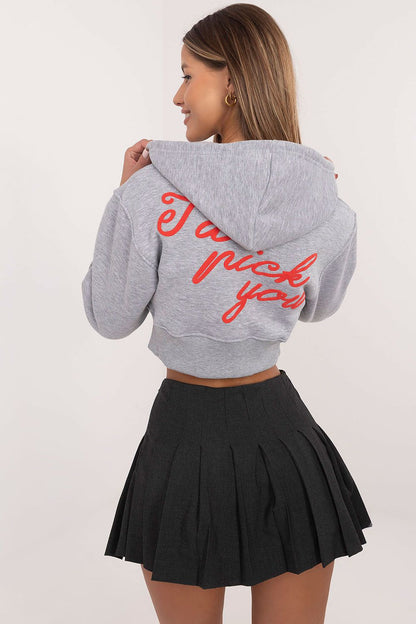 Fashionable women's zip-up sweatshirt model showcasing dynamic lettering and sleek fit, designed by Factory Price for ultimate comfort and style.
