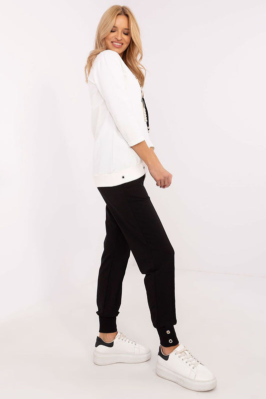 Exquisite sweatshirt with round neckline and 3/4 sleeves, showcasing a charming teddy bear print, designed for comfort by Factory Price.