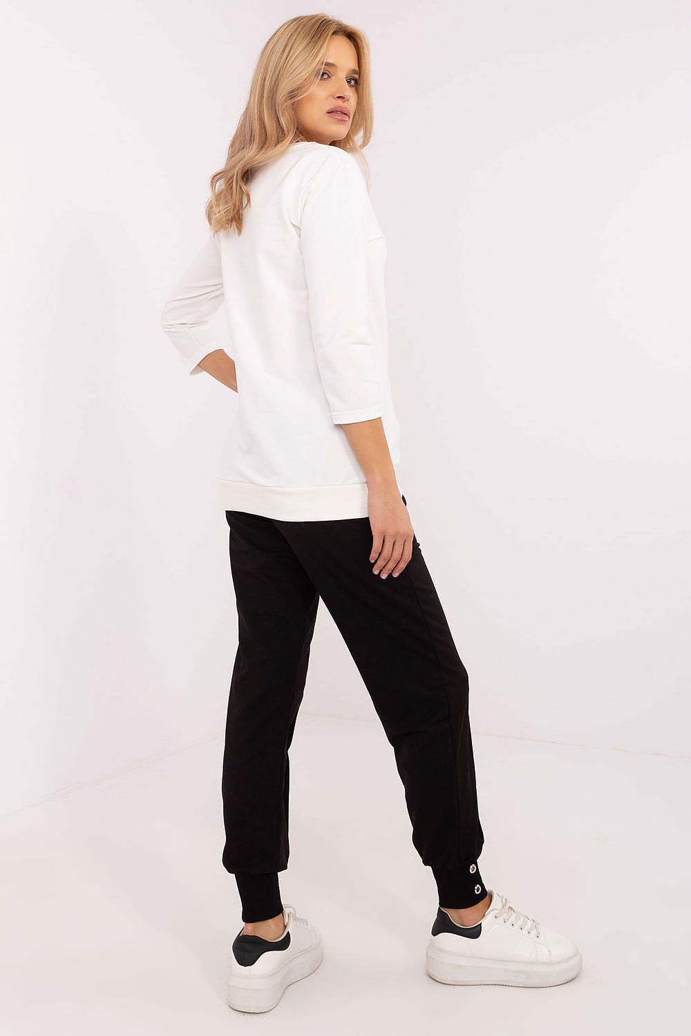 Premium cotton and spandex sweatpants with ribbed cuffs and side pockets, perfectly matching the teddy bear print sweatshirt by Factory Price.