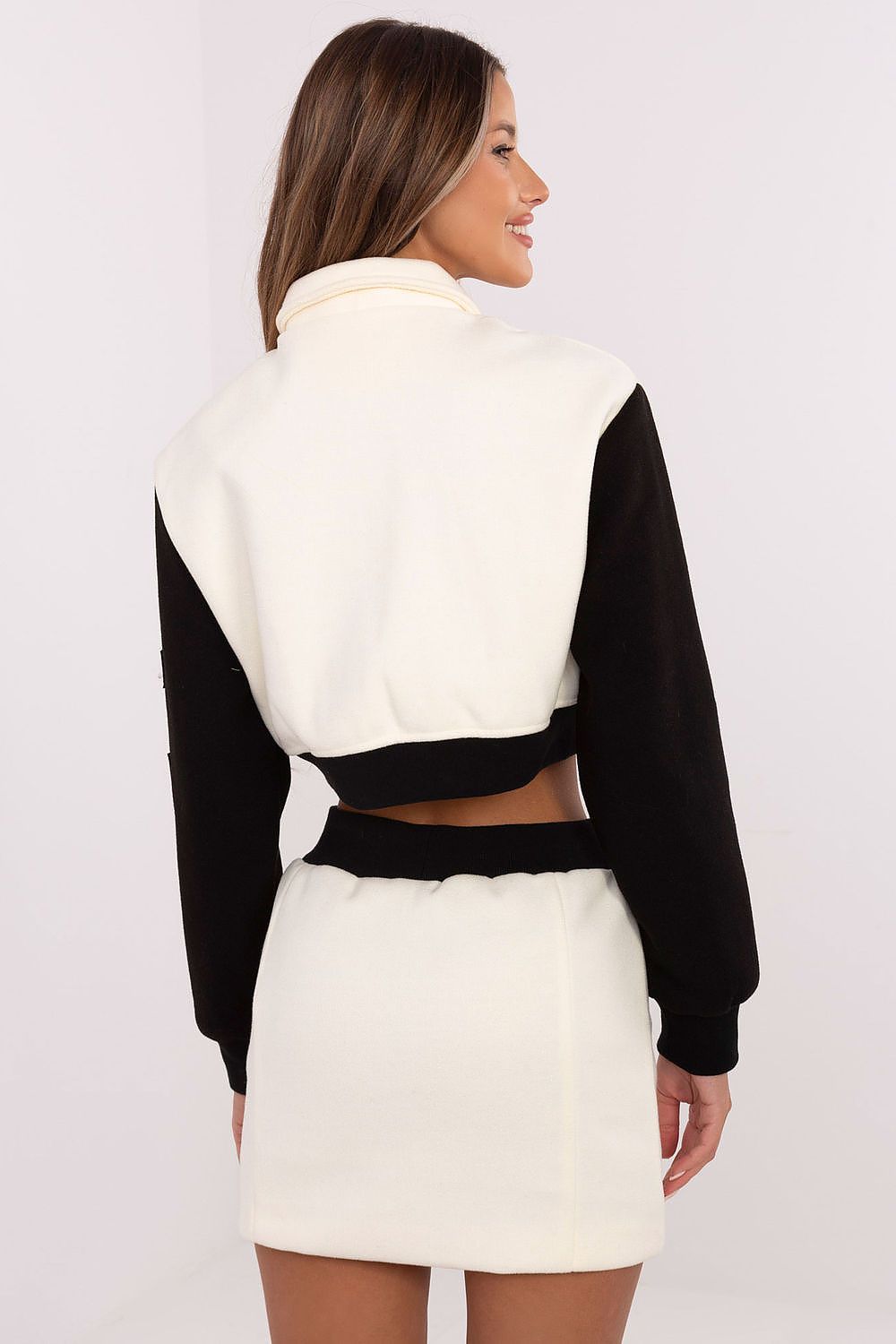 Wide elastic waistband of the short skirt in the NM women's casual style set, designed for comfort and elegance in everyday wear.