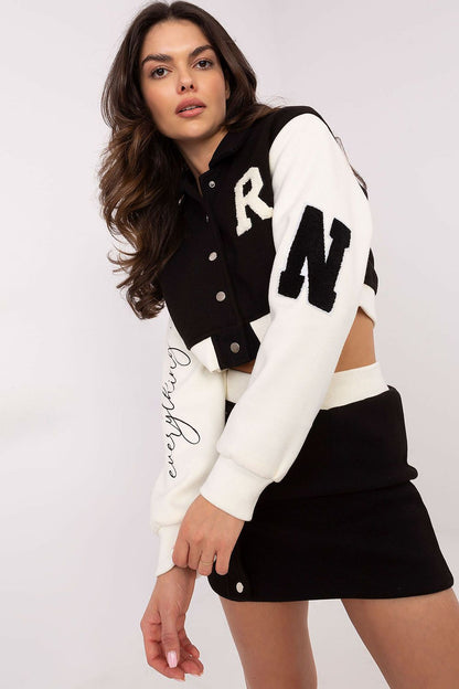 Elegant women's casual style set by NM featuring a stylish polyester blouse with long sleeves, stand-up collar, and embroidered decorative patches, designed for comfort and modernity.