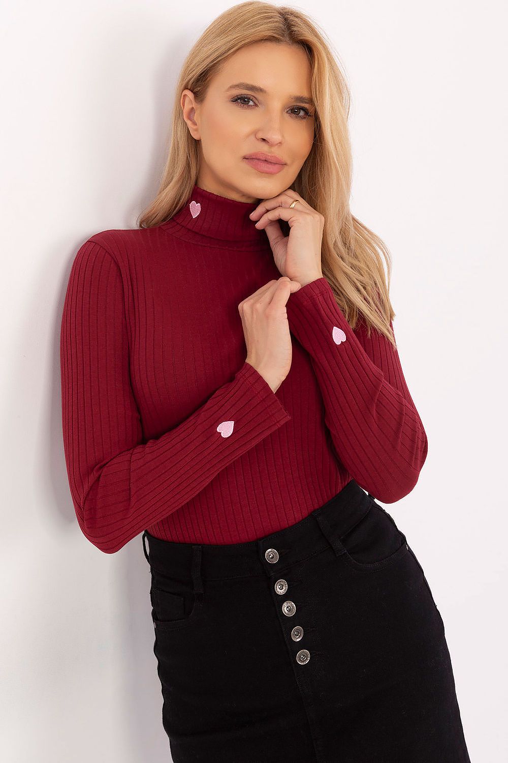 Model wearing the Relevance elegant women's turtleneck sweater, styled for a chic everyday look, perfect for both office wear and casual outings.