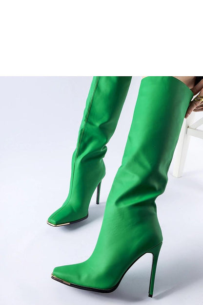 Luxurious green heeled boots for women, offering timeless elegance and warmth for winter, designed by Solea.