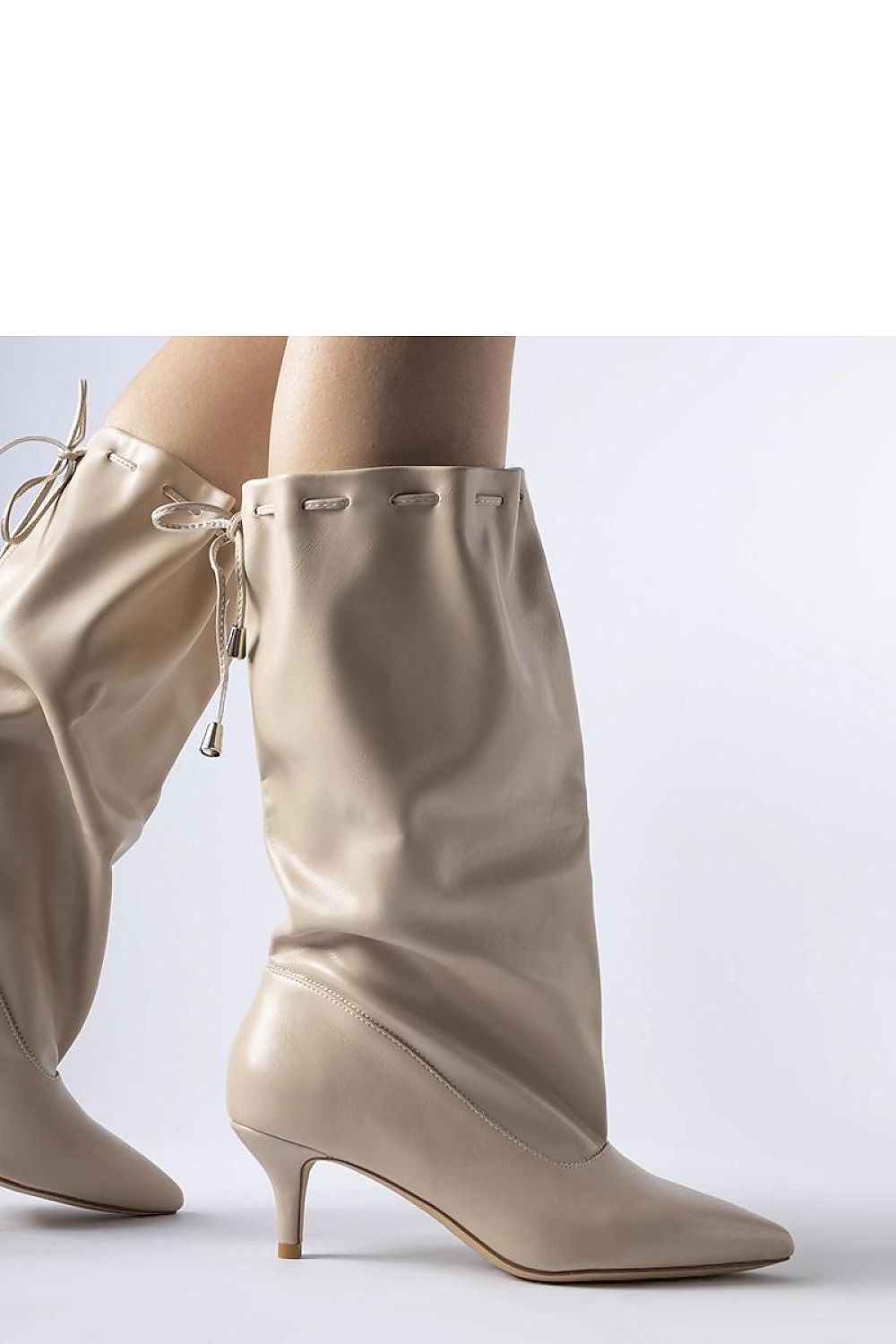 Elegant luxury stiletto heeled boots crafted from eco leather, designed by Solea, showcasing their stunning heel height of 5.5 cm.