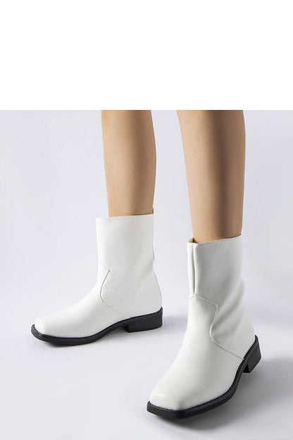 Solea Eco Leather Ankle Boots with 3.5cm heel, luxury footwear in EU sizes 36-41, showcasing sophistication and sustainability.