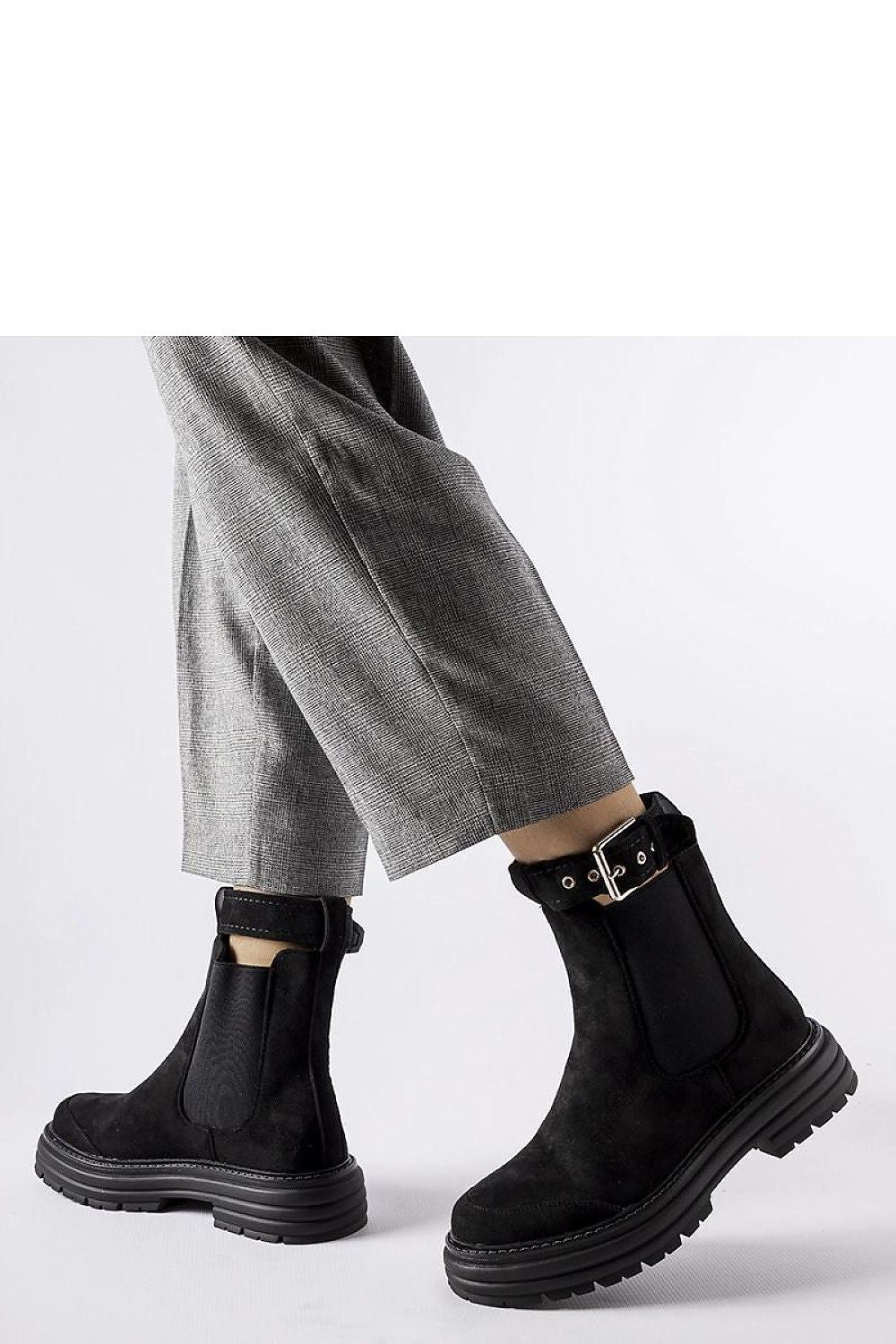 Elegant Abela ankle boots by Solea in vegan leather, featuring a 5 cm heel, perfect for sophisticated seasonal styling. These black ankle boots showcase decorative fastening and are available in EU sizes 36-41, ideal for adding a touch of luxury to any outfit.