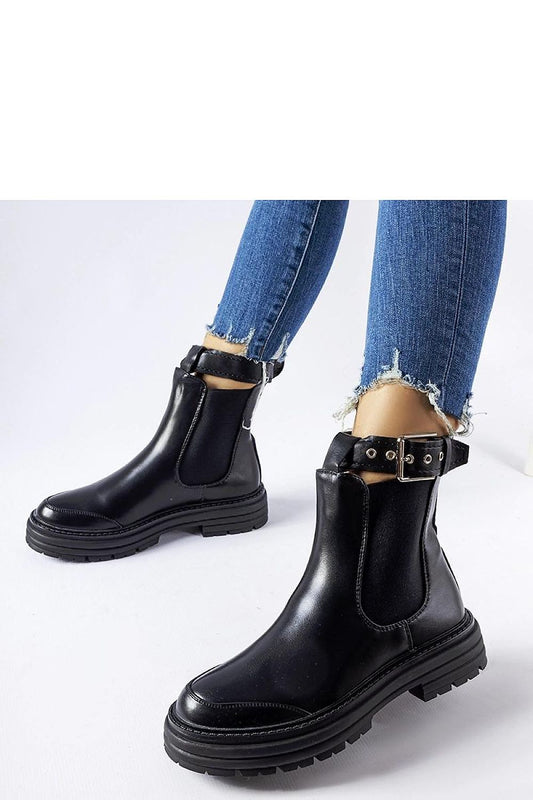 Elegant black ankle boots for women by Solea, featuring a stylish decorative fastening, medium 5 cm heel for comfort, crafted from eco leather for weather resistance, ideal for autumn and winter fashion.