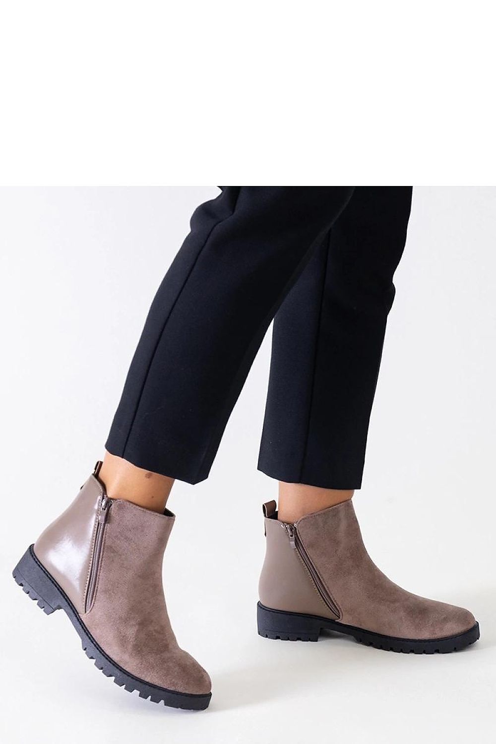 Elegant Solea black eco-suede platform ankle boots showcasing a stylish design, suitable for women seeking comfort and luxury in cooler weather.