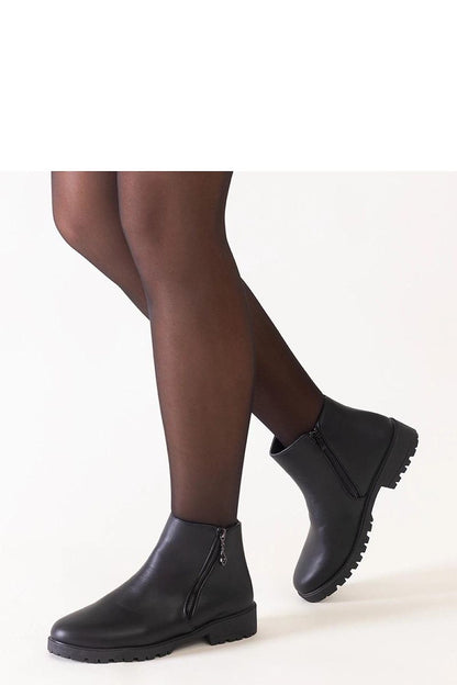 Solea brown ankle boots with a 3 cm flat heel and zipper closure, blending comfort and luxury in eco-friendly materials for the modern wardrobe.