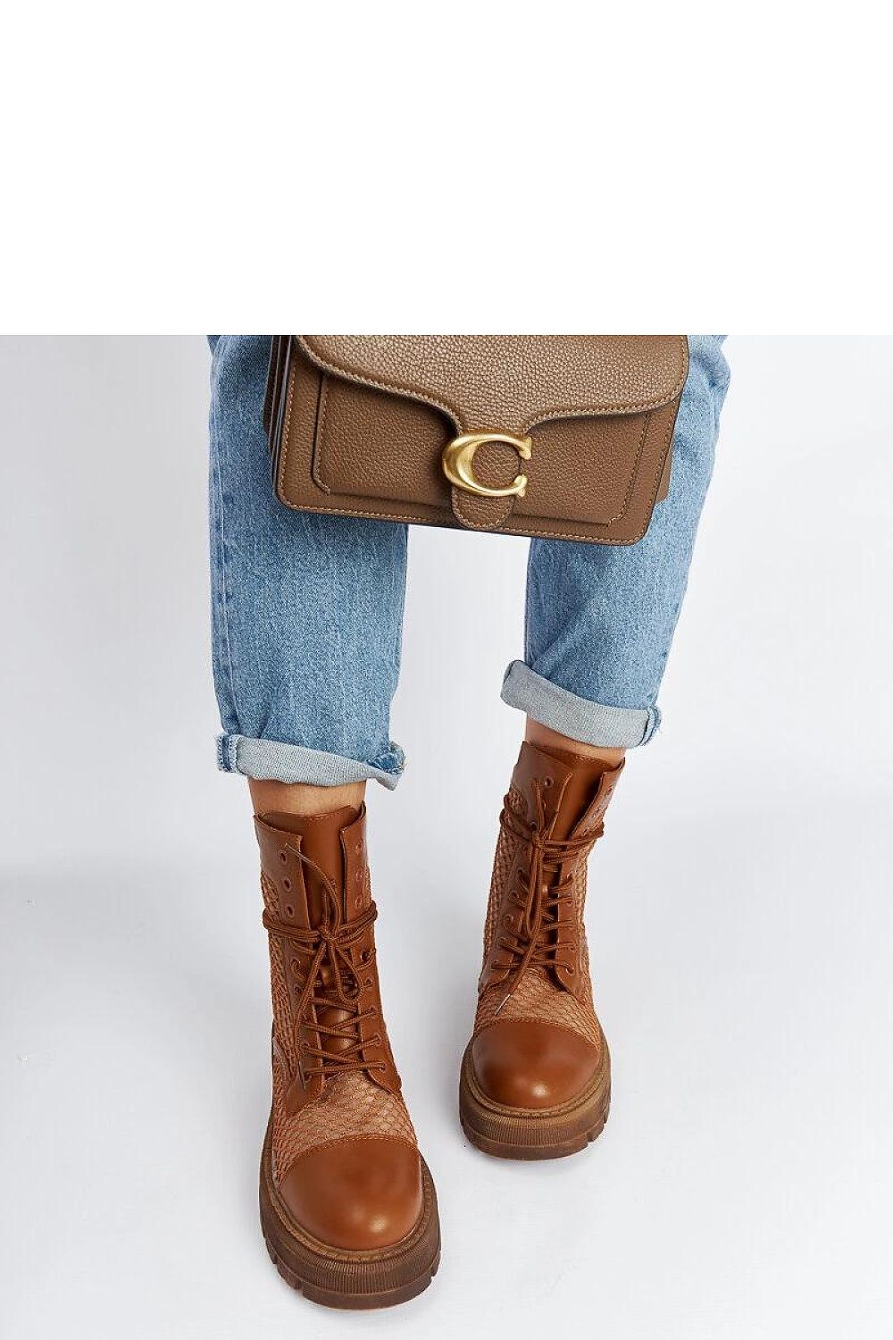 Elegant Solea Brown Translucent Waldeck Trappers crafted from eco leather, perfect for winter fashion and warmth.