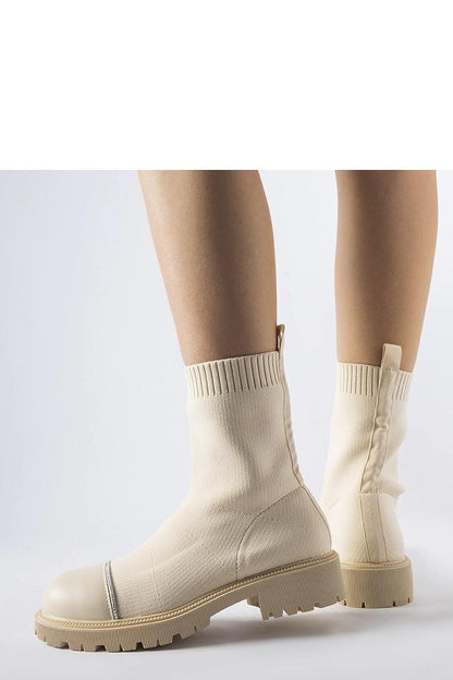 Solea elegant beige sock boots made of flexible rubber, ideal for autumn and spring, combining comfort and fashion with a shimmering design.