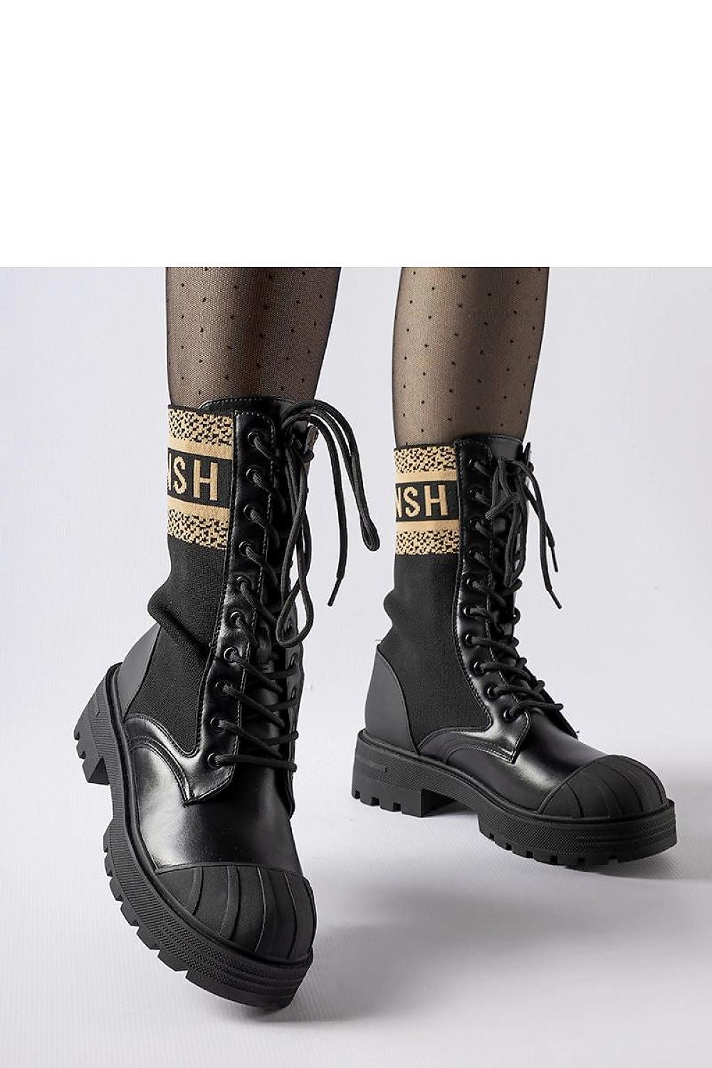 Elegant Solea black sock boots featuring a brown Daria inscription, ideal for women seeking stylish and comfortable footwear.