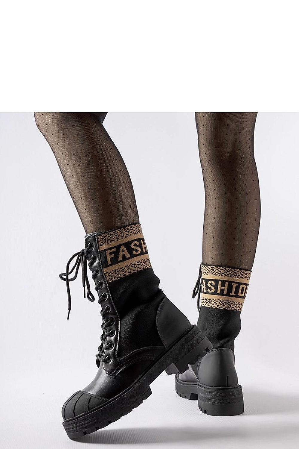 Sophisticated Solea black sock boots with a modern design, combining comfort and style for the contemporary woman.