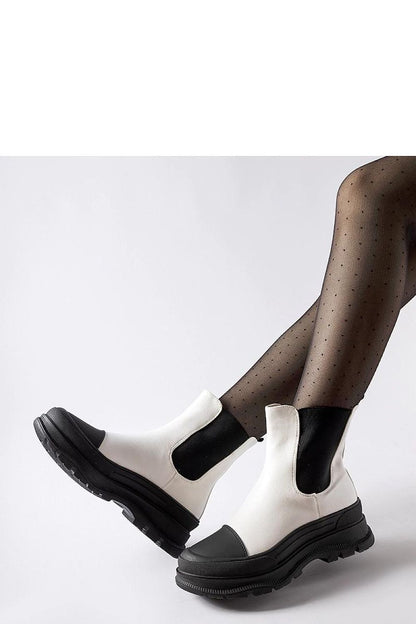 Elegant Solea white ankle boots with round toe design and laces, made from high-quality eco leather for comfort and style.