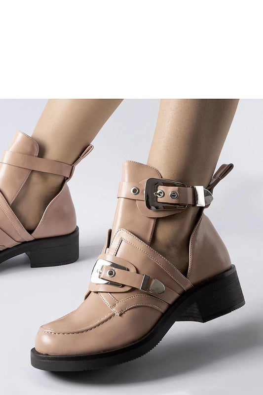 Luxurious Solea Pink Sperone Cutout Boots crafted from eco leather, showcasing a stylish design perfect for waterproof winter wear, available in EU sizes 36-41.