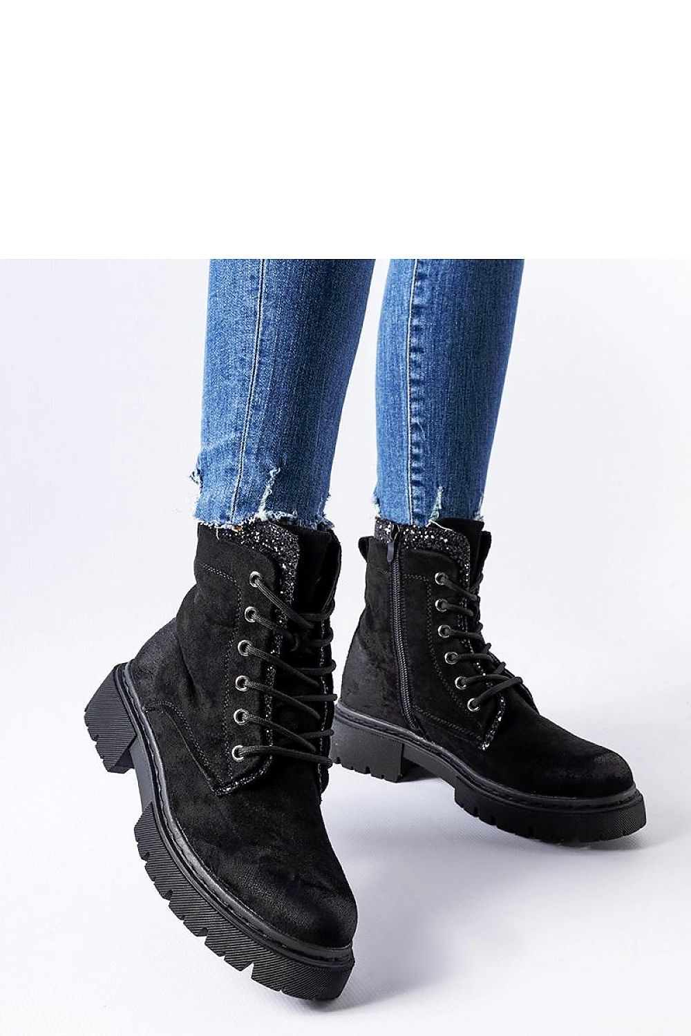 Elegant eco-leather black ankle boots by Solea, showcasing a flat heel and insulated interior for comfort, perfect for autumn and spring fashion.