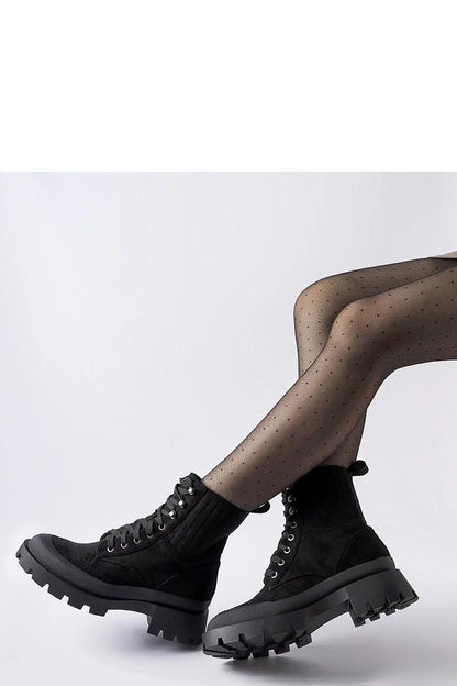 Close-up view of Solea Black Orson eco-suede ankle boots showcasing the luxurious soft lining, ideal for all-day comfort and sophisticated fashion.